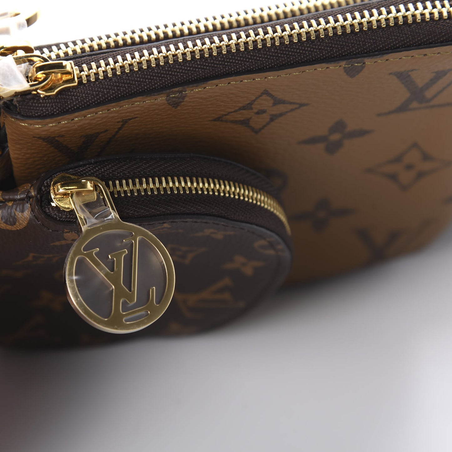 Reverse Monogram Giant Trio Pouch