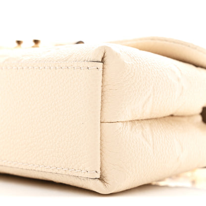 Louis Vuitton Empreinte Monogram Nano Madeleine Creme 9 of 10