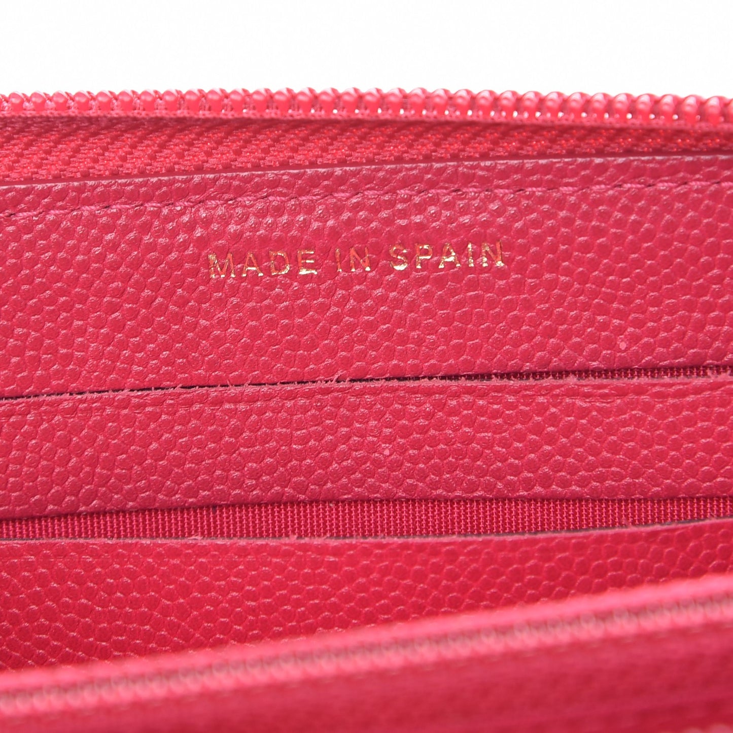 Caviar Quilted Small Boy Zip Around Wallet Fuchsia