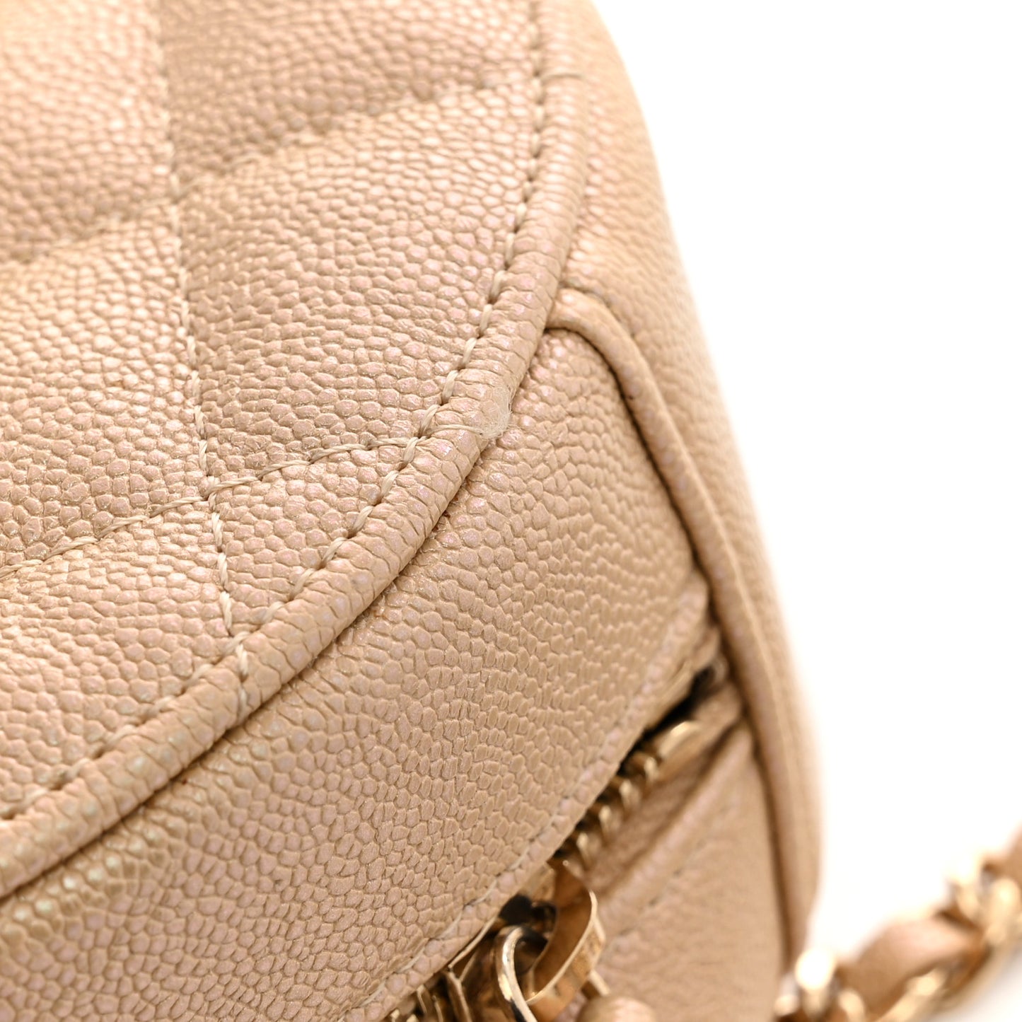 Iridescent Caviar Quilted Round Clutch With Chain Beige