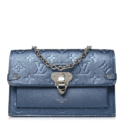Louis Vuitton Metalli Empreinte Monogram Vavin Chain Wallet Navy Nacre 1 of 8