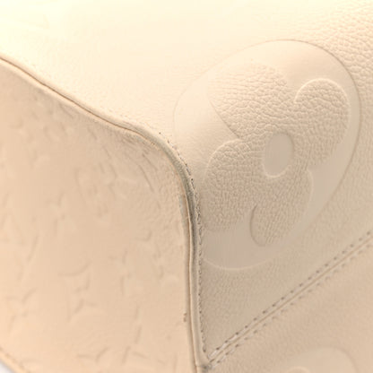 Louis Vuitton Empreinte Monogram Giant Onthego PM Cream Beige 10 of 17