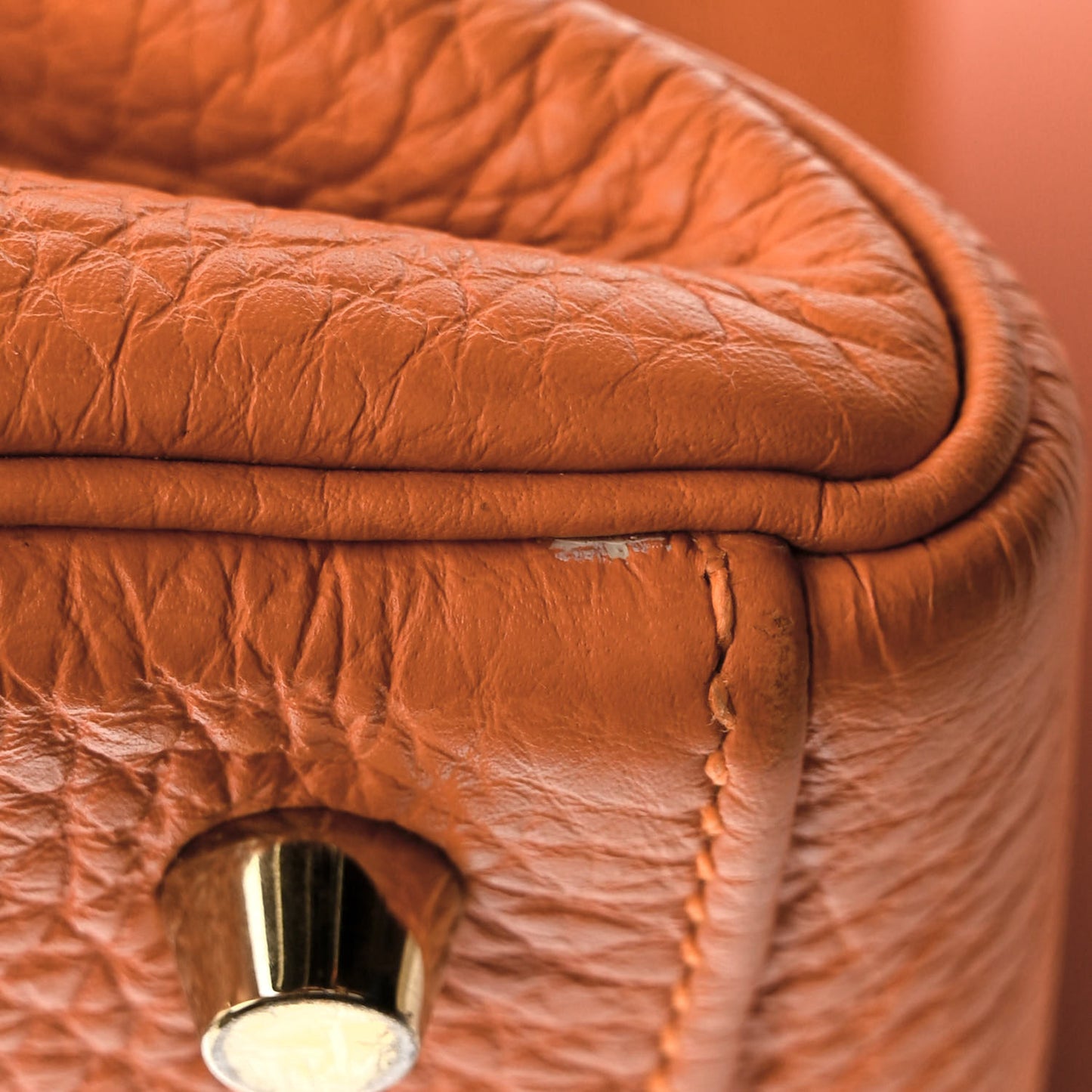 Togo Kelly Retourne 35 Orange