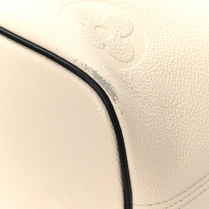 Louis Vuitton Empreinte Monogram Giant Wild at Heart Neverfull MM Creme 9 of 11