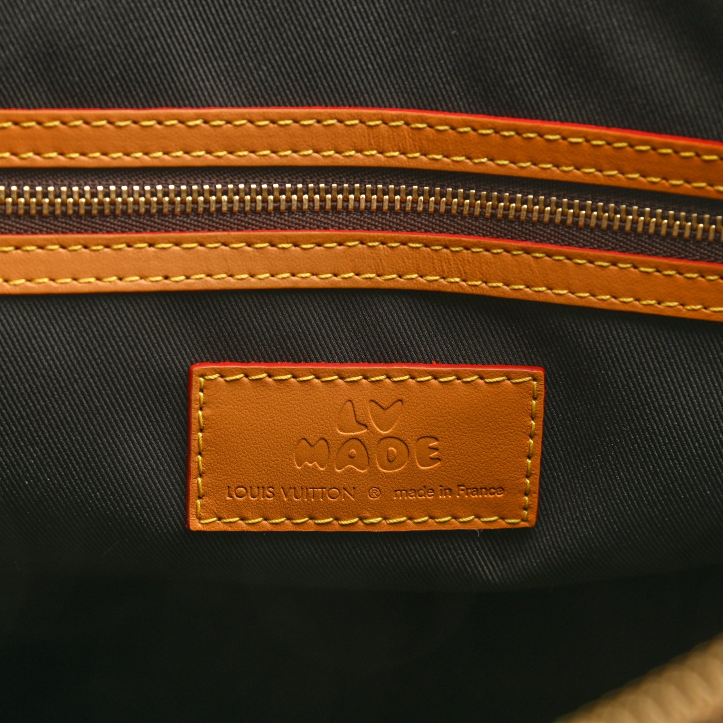 X NIGO Reverse Monogram Stripe Keepall Bandouliere 50 Brown