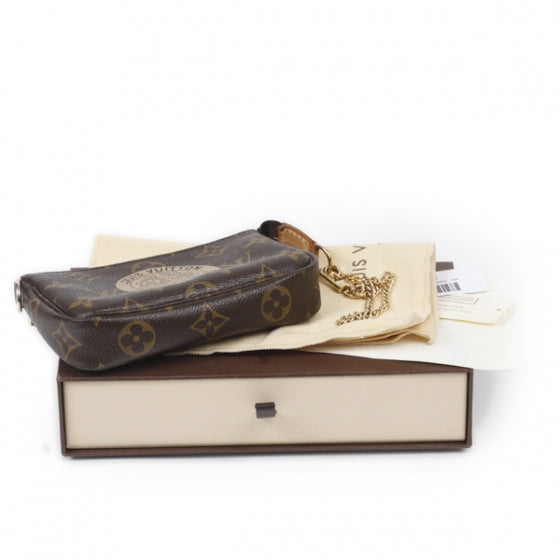 Monogram Complice Trunks and Bags Mini Pochette Accessories Beige