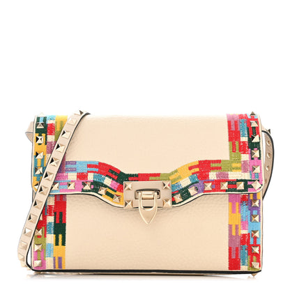Valentino Garavani Pebbled Calfskin Embroidered Medium Rockstud Flip Lock Crossbody Bag Ivory 1 of 9