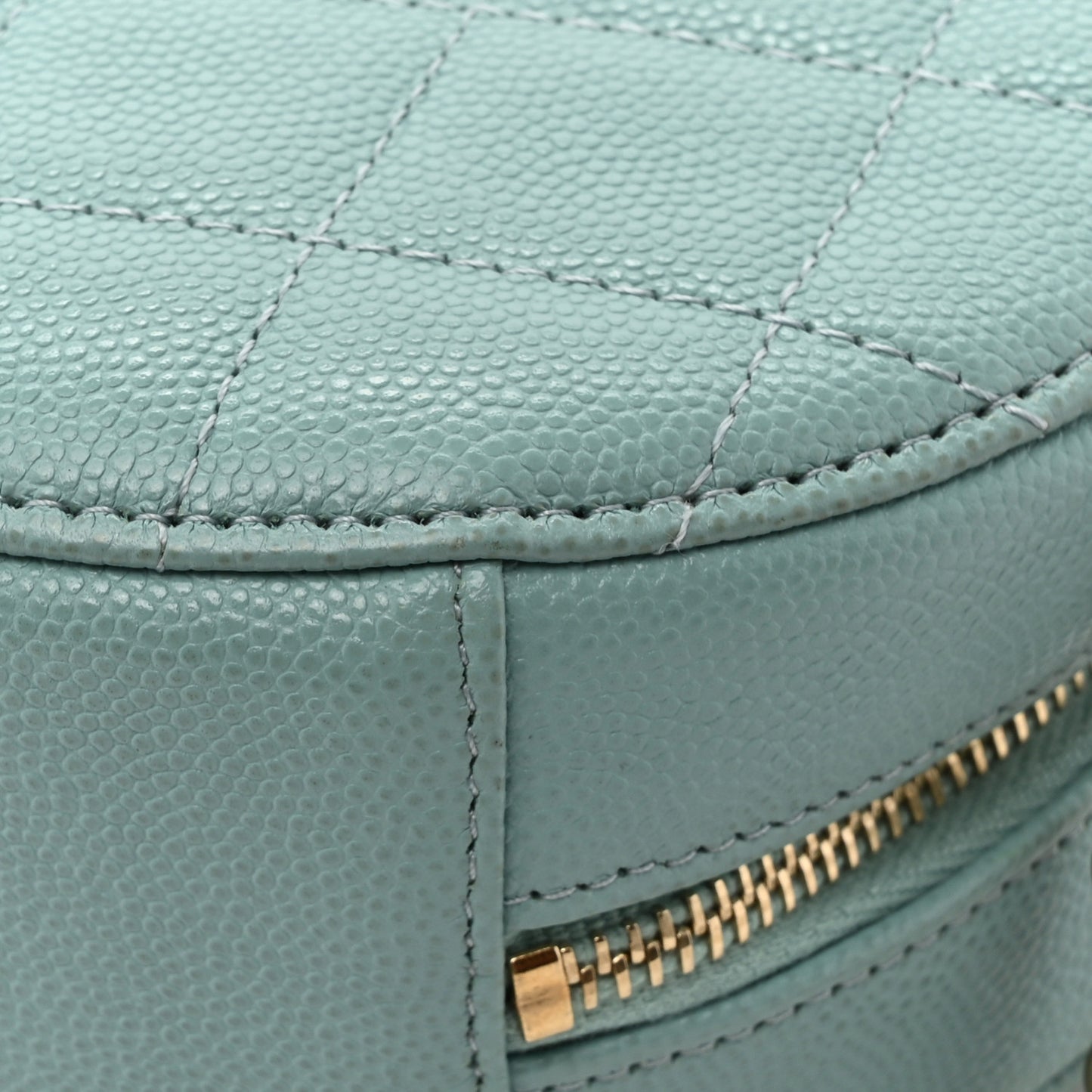Caviar Quilted Round Clutch With Chain Light Blue