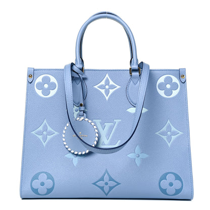 Louis Vuitton Empreinte Monogram Giant By The Pool Onthego MM Summer Blue 1 of 10