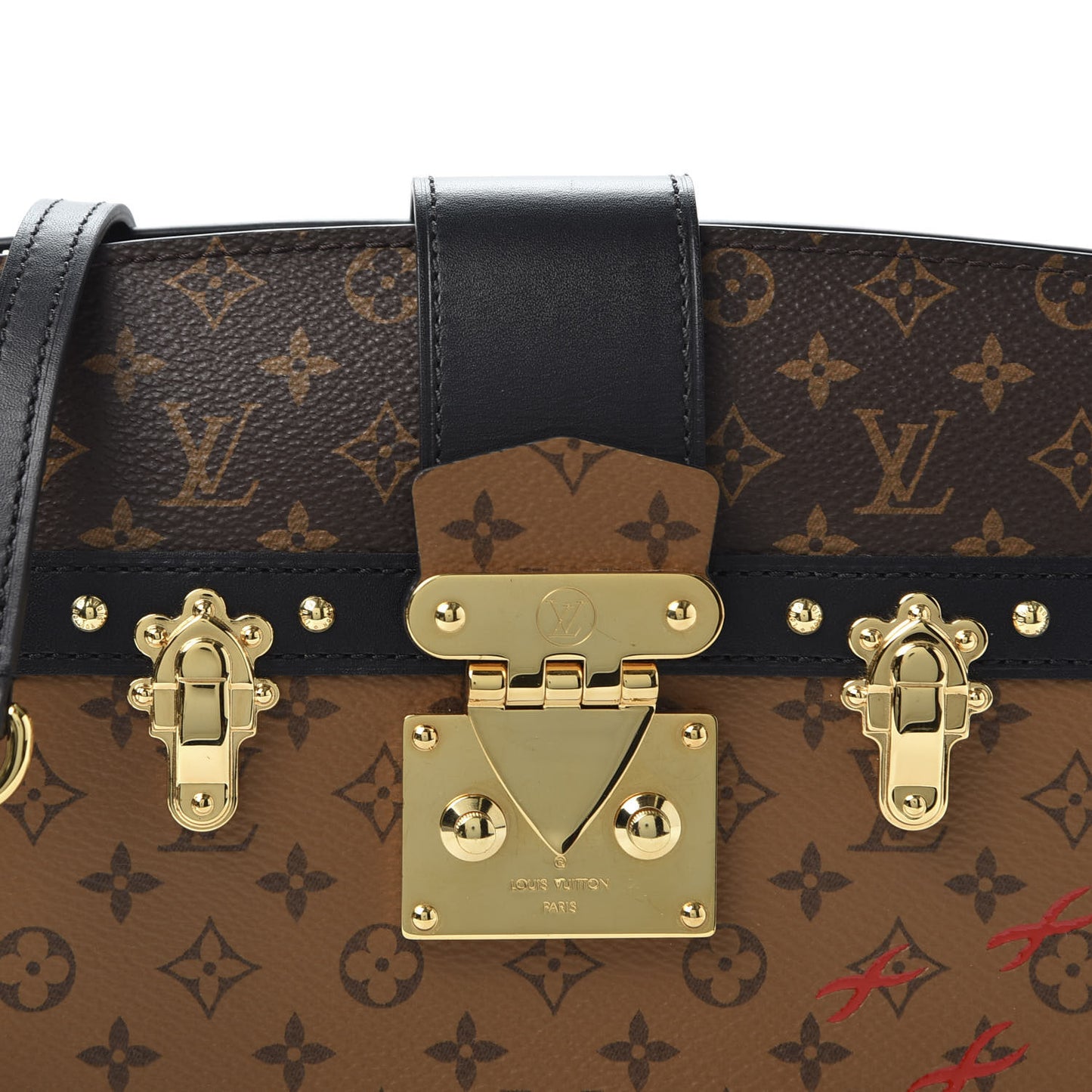 Reverse Monogram Trunk Clutch
