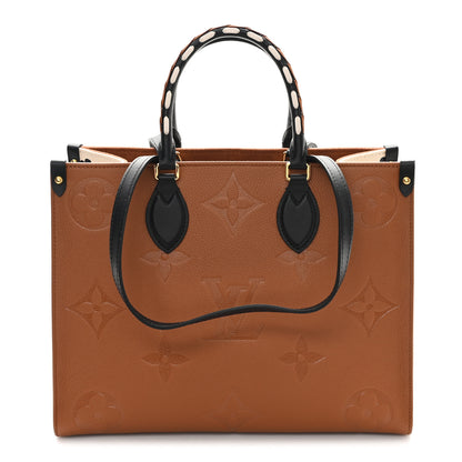 Louis Vuitton Empreinte Monogram Giant Wild At Heart Onthego MM Caramel 1 of 9
