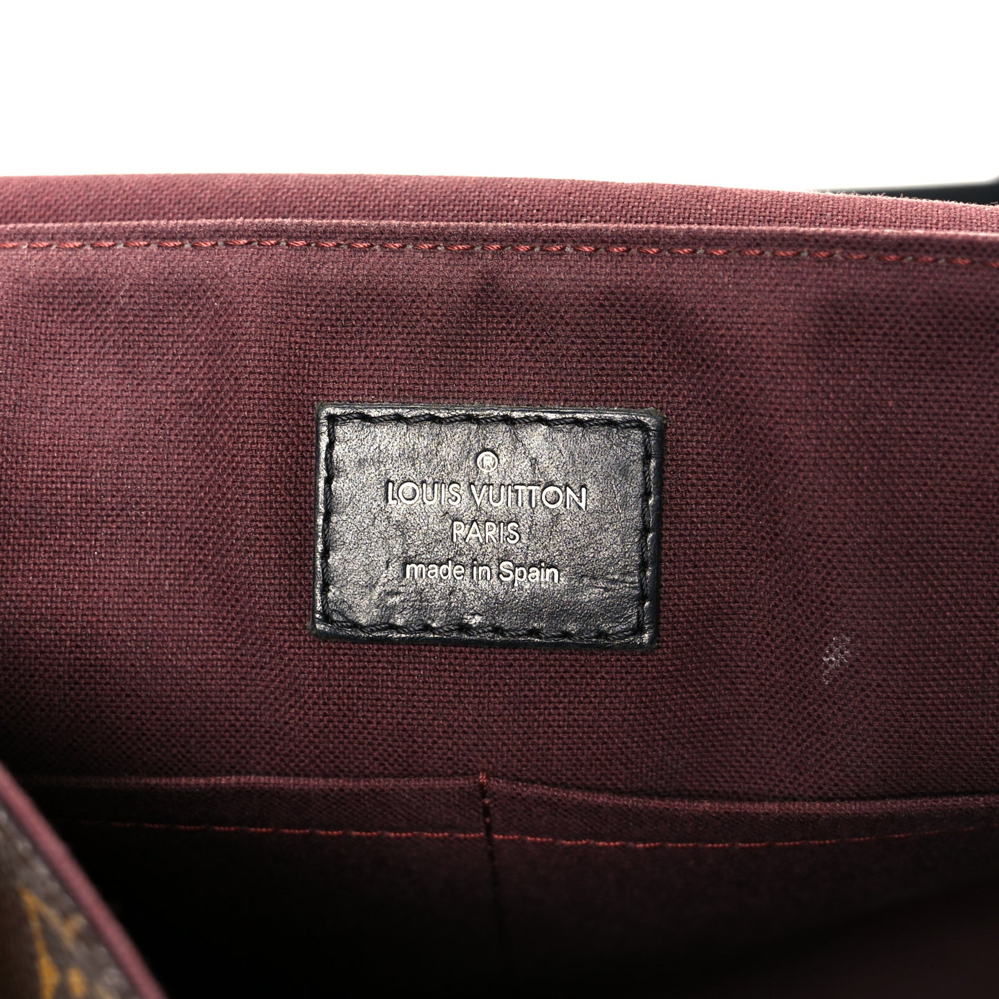 Monogram Macassar District PM