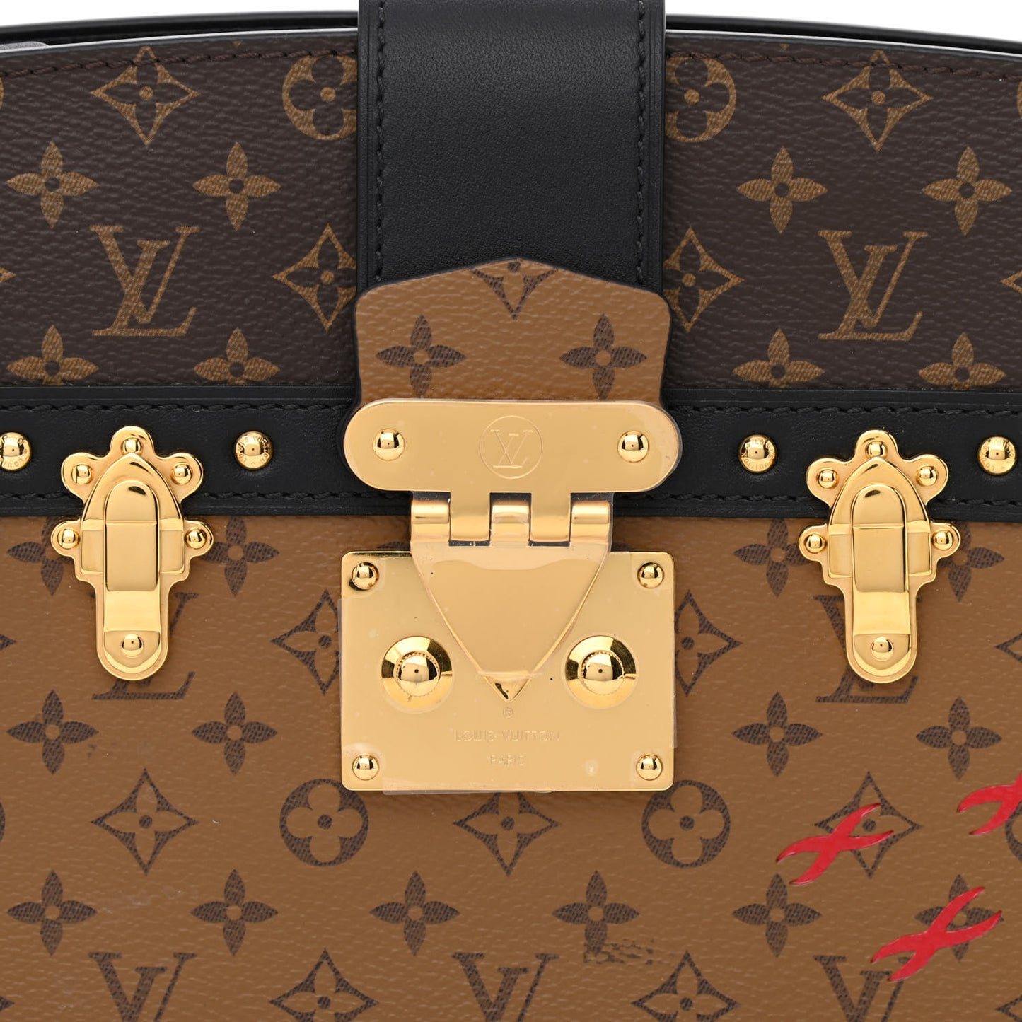 Reverse Monogram Trunk Clutch