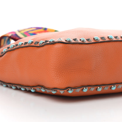 Valentino Garavani Pebbled Calfskin Small Guitar Strap Rockstud Rolling Flip-Lock Messenger Bag Orange 8 of 10