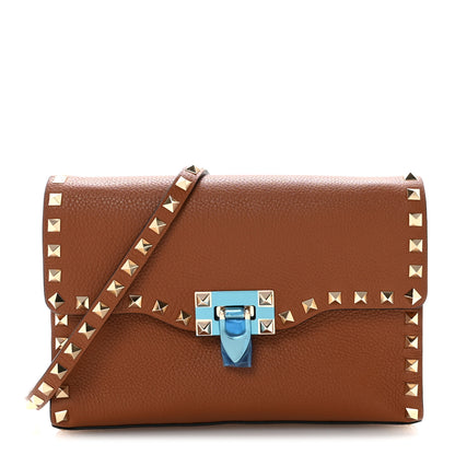 Valentino Garavani Pebbled Calfskin Medium Rockstud Flip Lock Crossbody Bag Saddle Brown 1 of 10