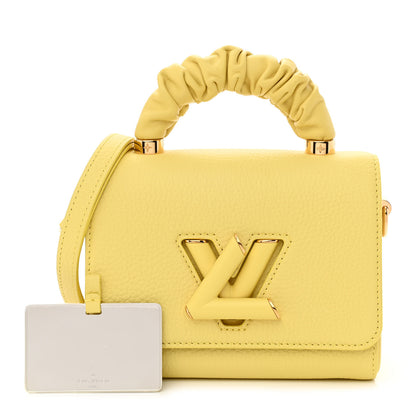 Louis Vuitton Taurillon Smooth Calfskin Scrunchie Twist One Handle PM Yellow 1 of 10