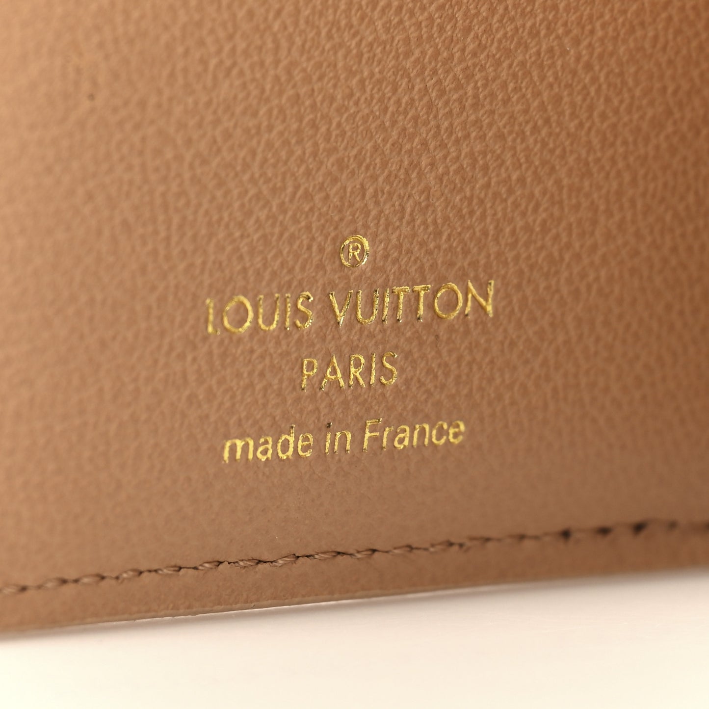 Lambskin Embossed Monogram Lou Coussin Wallet Camel