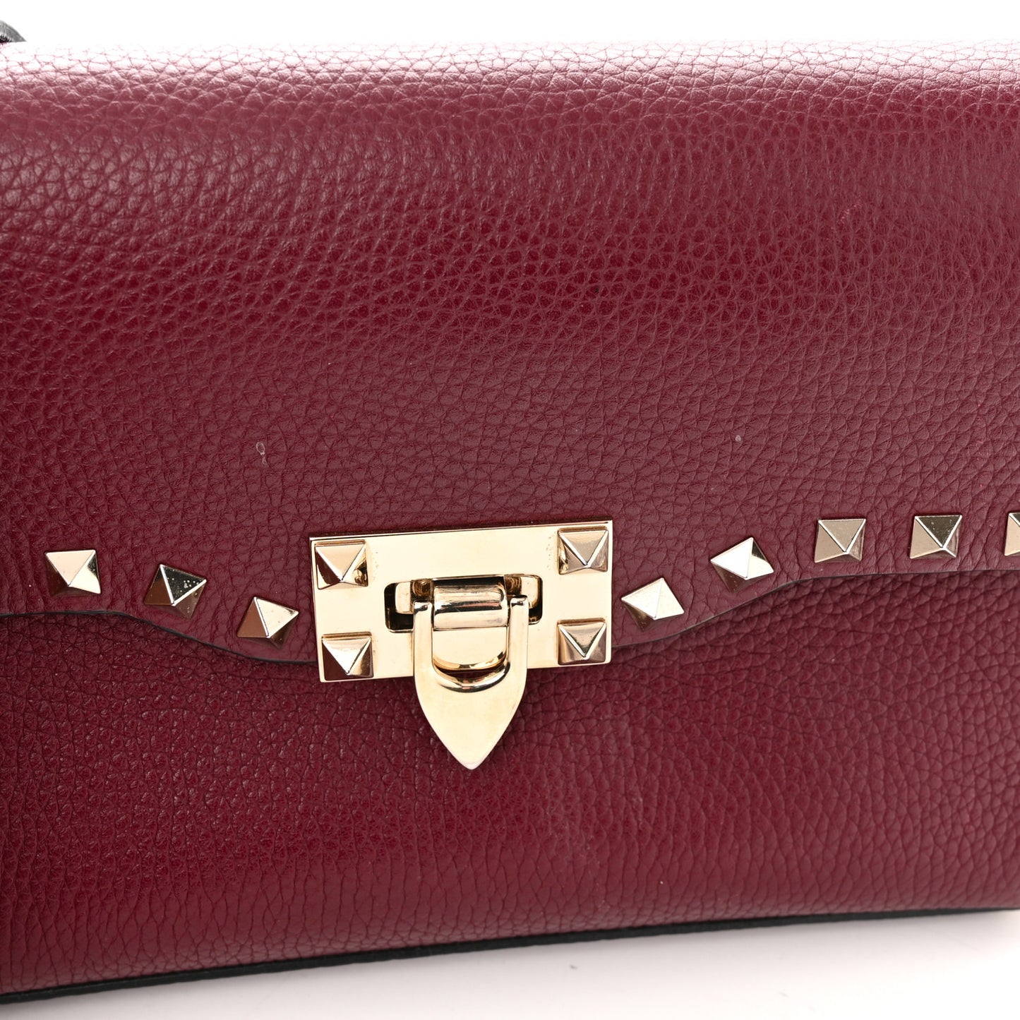 Pebbled Calfskin Medium Rockstud Flip Lock Crossbody Bag Rubin