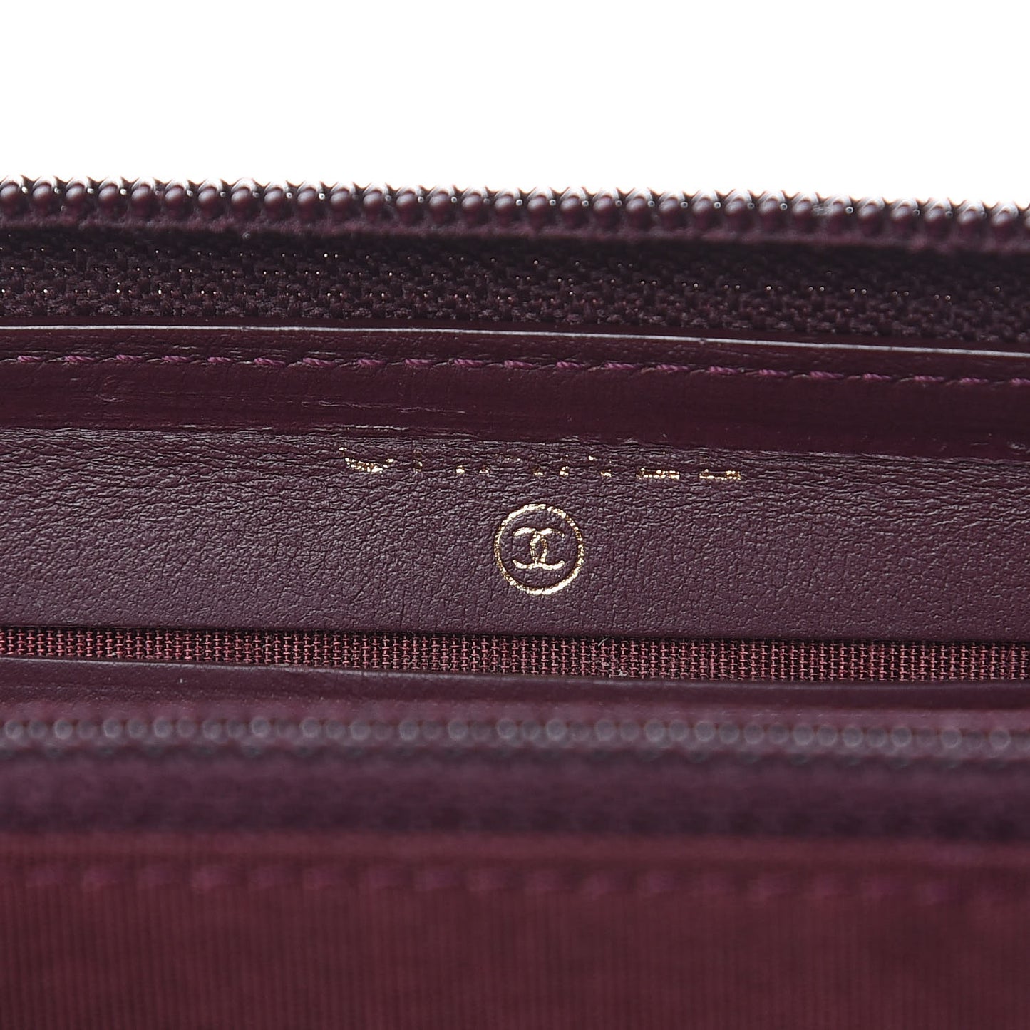 Caviar Quilted Small Boy Zip Around Wallet Dark Purple