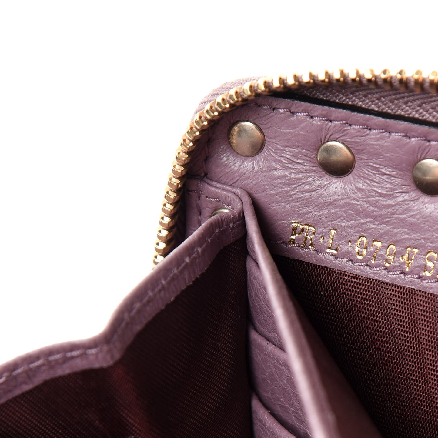 Pebbled Calfskin Rockstud Zip Around Wallet Dark Mauve