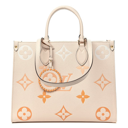 Louis Vuitton Empreinte Monogram Giant By The Pool Onthego MM Cream Saffron 1 of 12