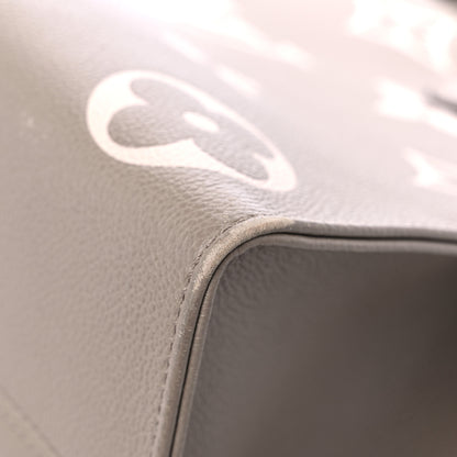 Louis Vuitton Empreinte Monogram Giant Onthego MM Tourterelle Creme 9 of 19