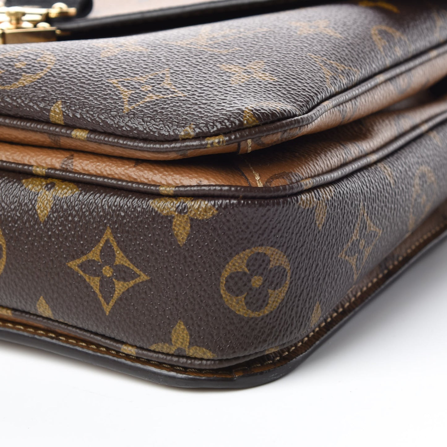 Reverse Monogram Pochette Metis