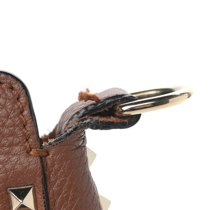 Valentino Garavani Pebbled Calfskin Small Rockstud Flip-Lock Messenger Bag Bright Cognac 9 of 13
