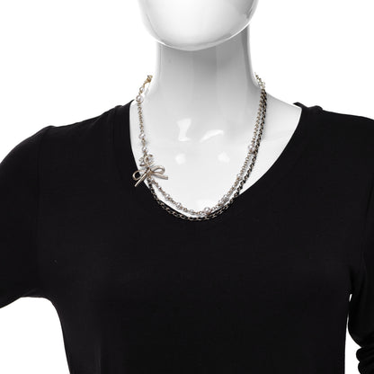 Chanel Calfskin Pearl Metal CC Bow Necklace Gold White Black 1 of 5