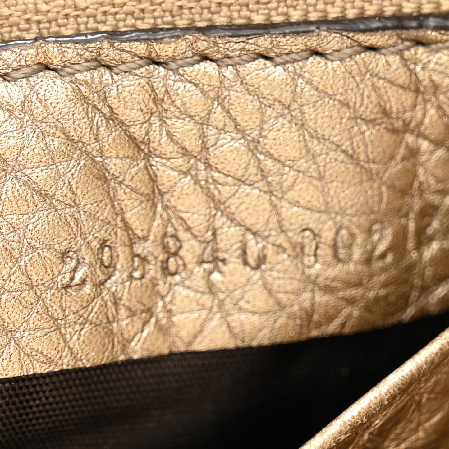 Metallic Pebbled Calfskin Soho Wristlet Golden Beige