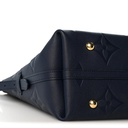 Louis Vuitton Empreinte Monogram Giant CarryAll MM Navy 9 of 10