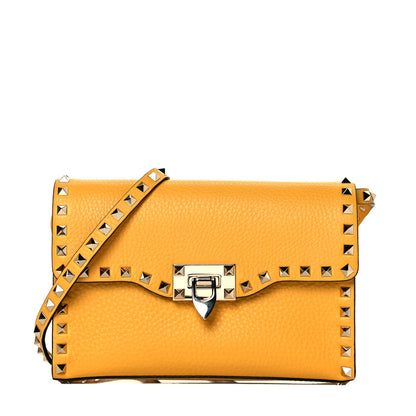 Valentino Garavani Pebbled Calfskin Medium Rockstud Flip Lock Crossbody Bag Yellow 1 of 15