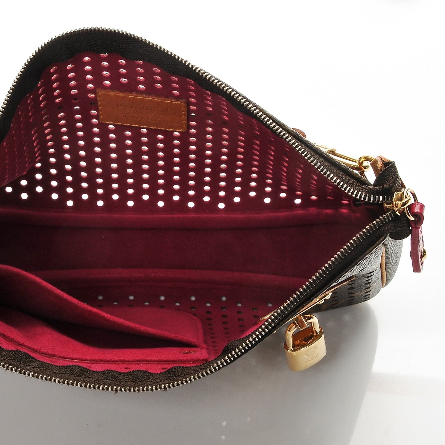 Monogram Perforated Pochette Accessories Bag Fuchsia