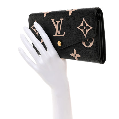 Louis Vuitton LOUIS VUITTON Monogram Empreinte Giant Sarah Wallet Black Beige 1 of 7