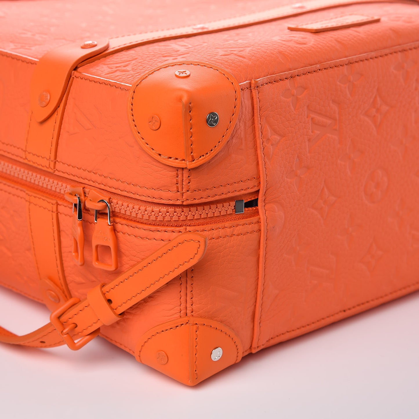 Taurillon Empreinte Soft Trunk Backpack PM Orange