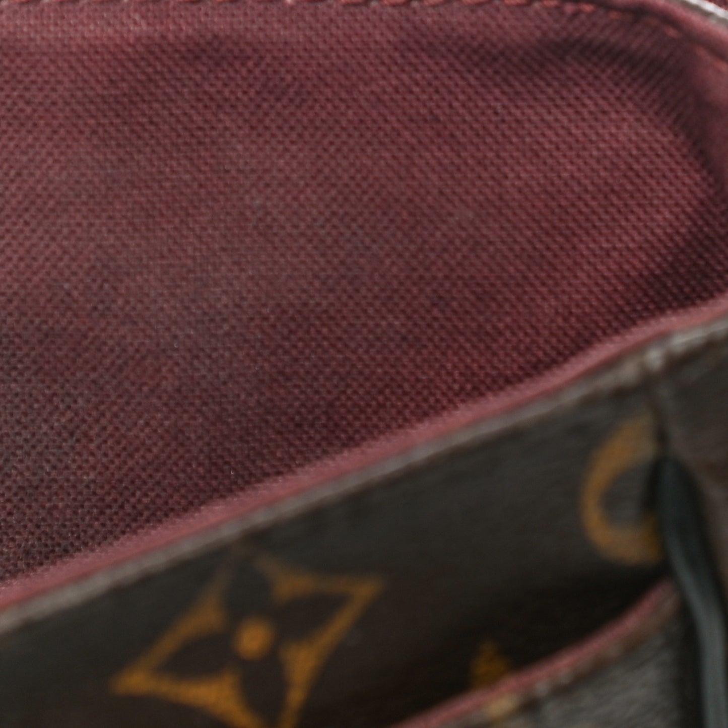 Monogram Macassar District PM