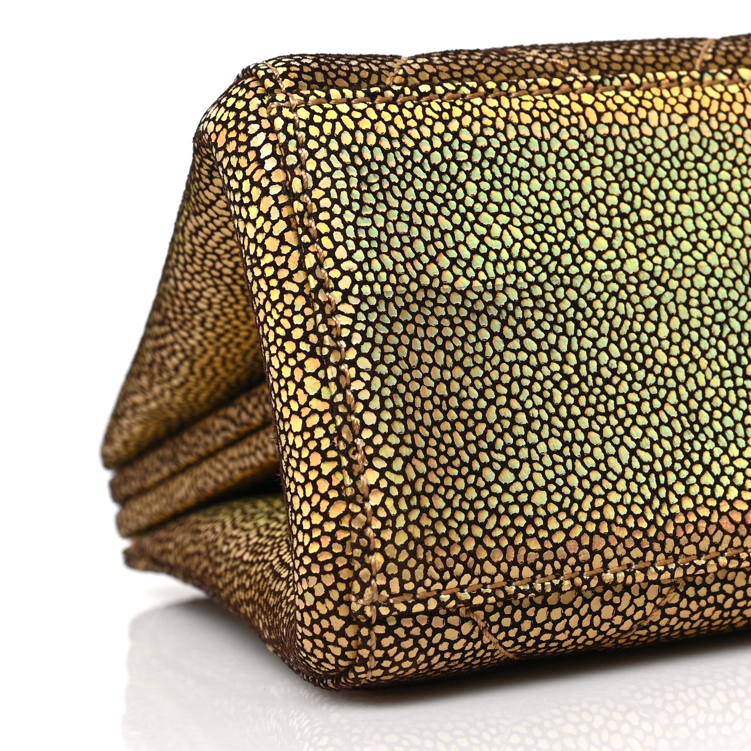 close up image of chanel metallic galuchat leather in gold by FASHIONPHILE