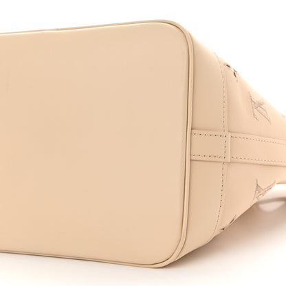 Louis Vuitton Calfskin Monogram Cutout Petit Noe Neutral 9 of 9