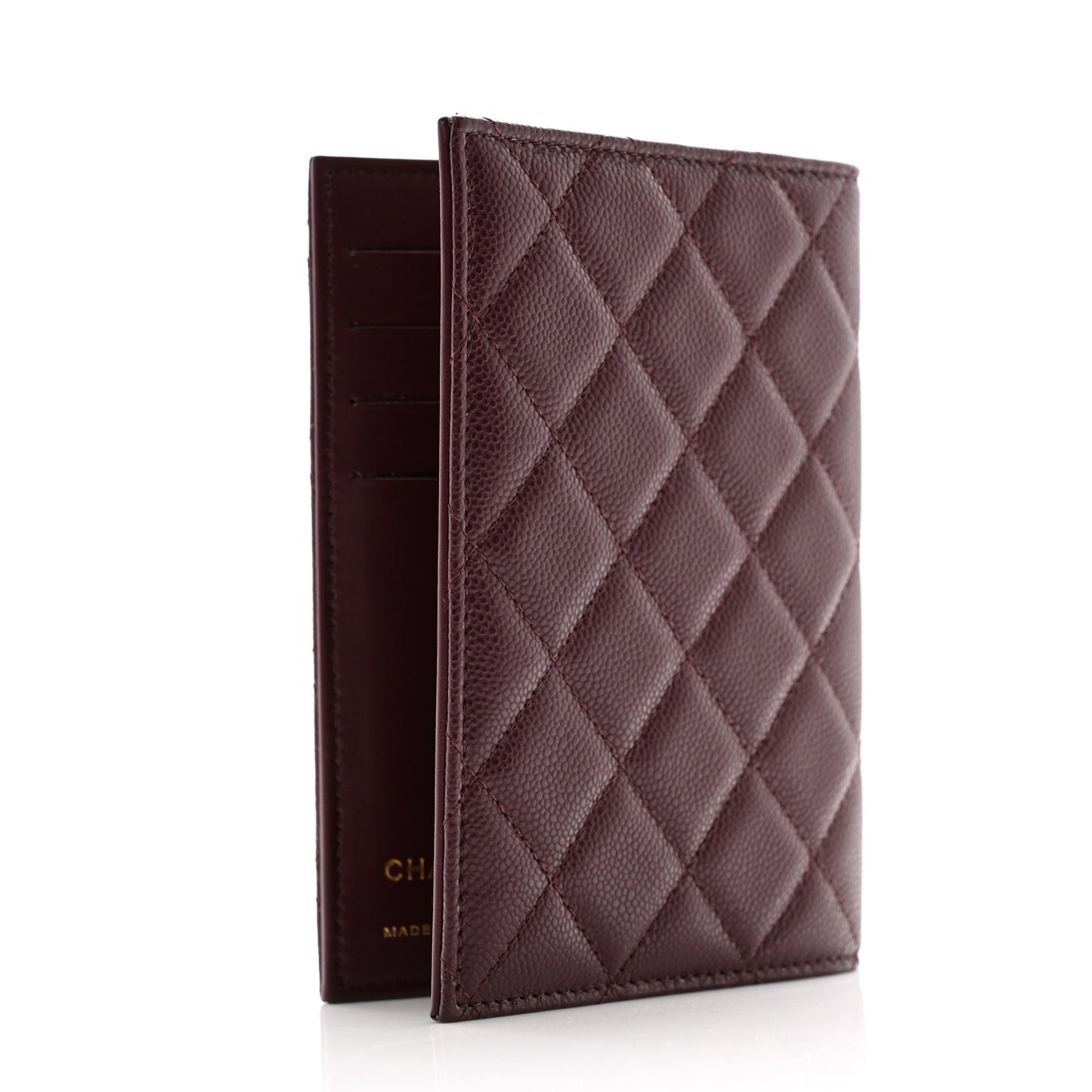 Caviar Quilted Passport Holder Dark Purple
