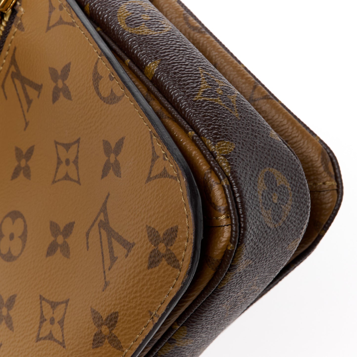 Reverse Monogram Pochette Metis