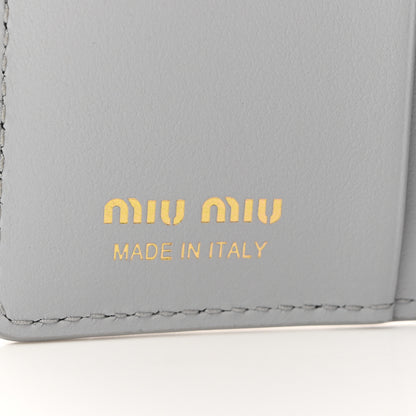 Miu Miu MIU MIU Calfskin Logo Embossed Bi-Fold Compact Wallet Fiordaliso 6 of 8