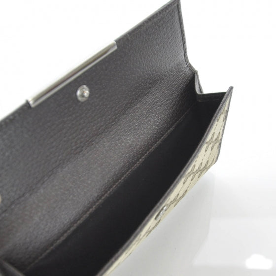 Monogram Metal Plate Continental Wallet