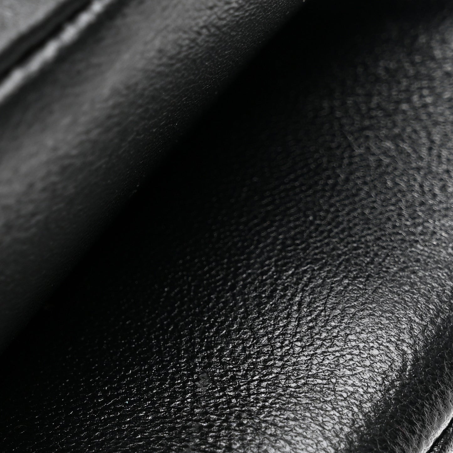 Lambskin Embossed Monogram Pochette Coussin Black