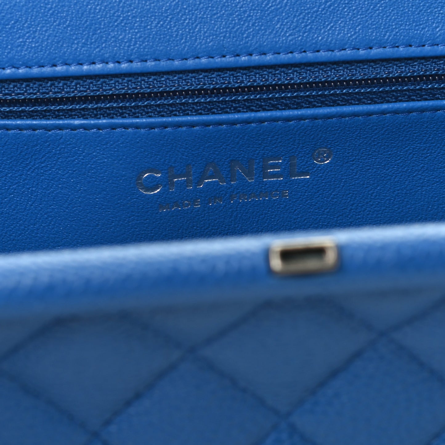 Caviar Quilted Timeless Clutch Blue