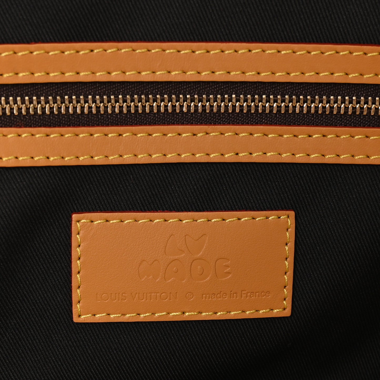 X NIGO Reverse Monogram Stripe Keepall Bandouliere 50 Brown