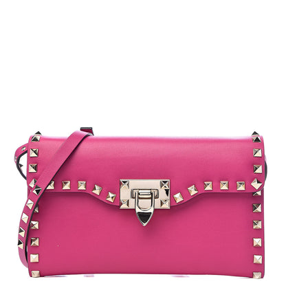 Valentino Garavani Vitello Medium Rockstud Flip Lock Crossbody Bag Deep Cyclamin 1 of 9