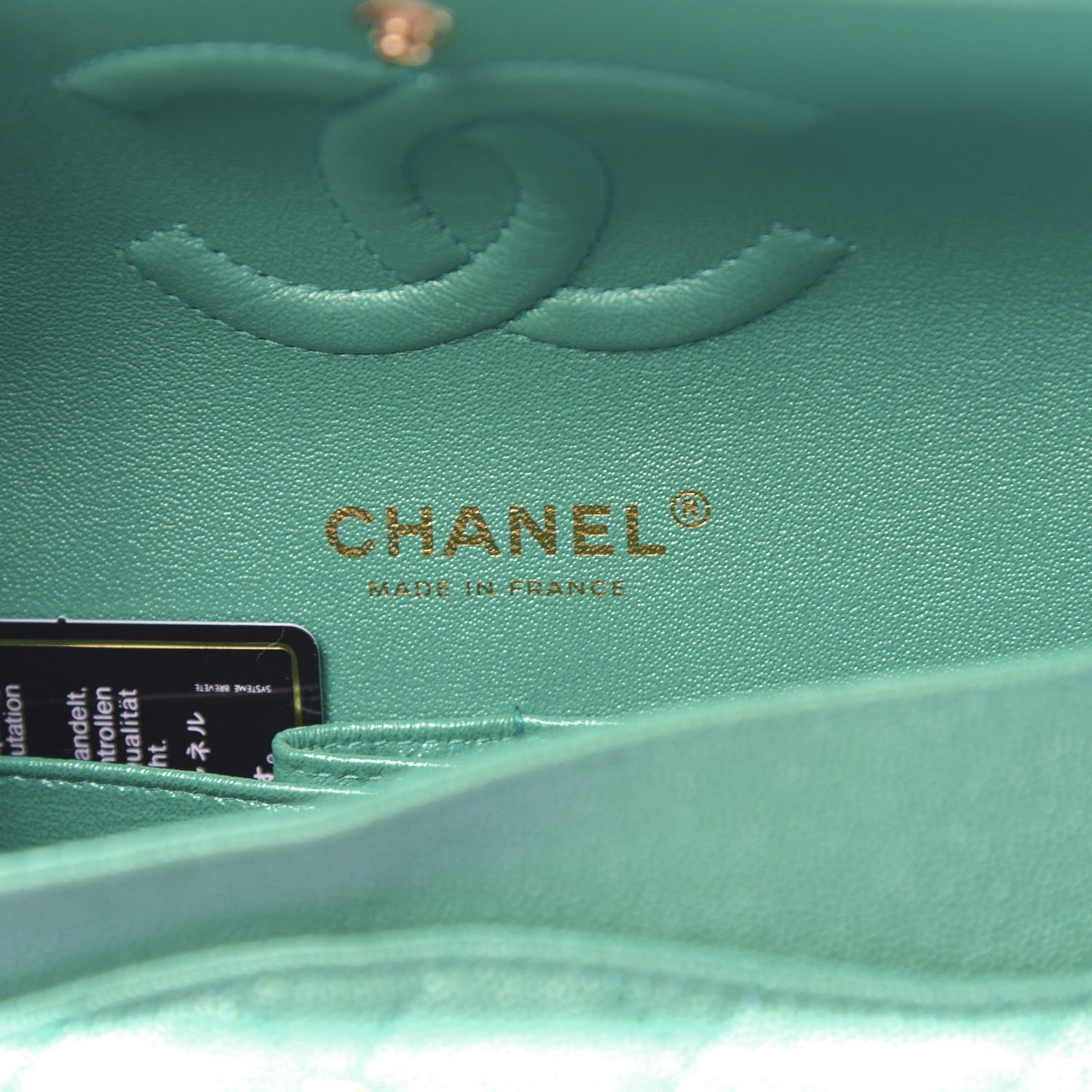 Iridescent Caviar Quilted Medium Double Flap Green