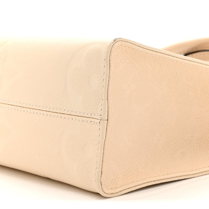 Louis Vuitton Empreinte Monogram Giant Onthego PM Cream Beige 9 of 9