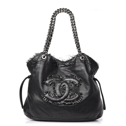 Chanel Tweed Lambskin Drawstring Tweedy Tote Black 1 of 9