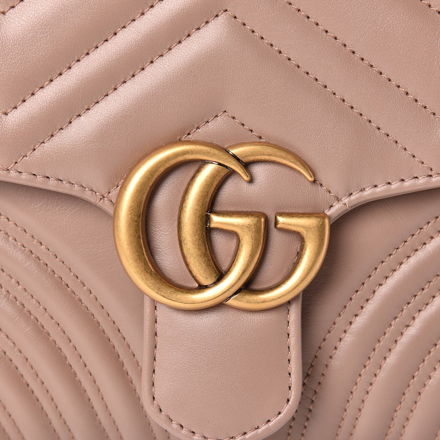 close up of an authentic GUCCI Calfskin Matelasse Small GG Marmont Top Handle Shoulder Bag Porcelain Rose FASHIONPHILE